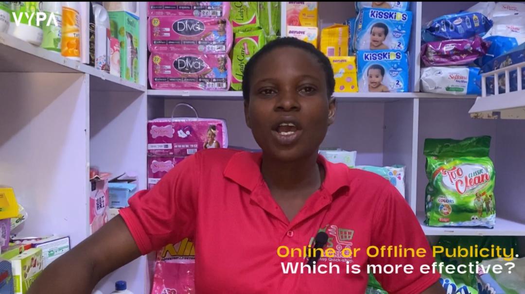 Shop owner discussing VYPA Digital Signage in a retail store